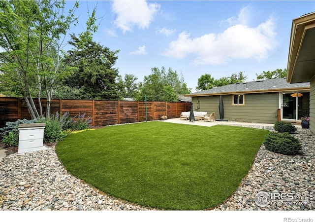 1217 Sycamore St, Fort Collins, CO 80521 - fenced backyard with a patio area and an outdoor hangout area