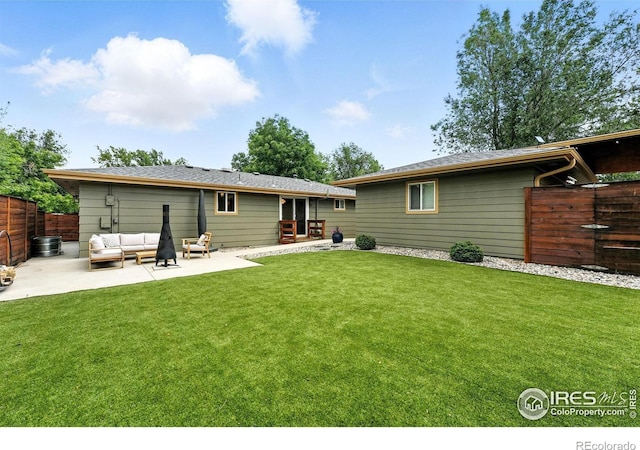 1217 Sycamore St, Fort Collins, CO 80521 - back of house featuring an outdoor living space, a patio area, and a fenced backyard