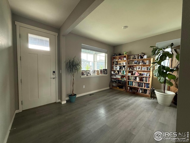 117 N 66th Ave, Greeley, CO 80634 - foyer featuring baseboards and wood finished floors