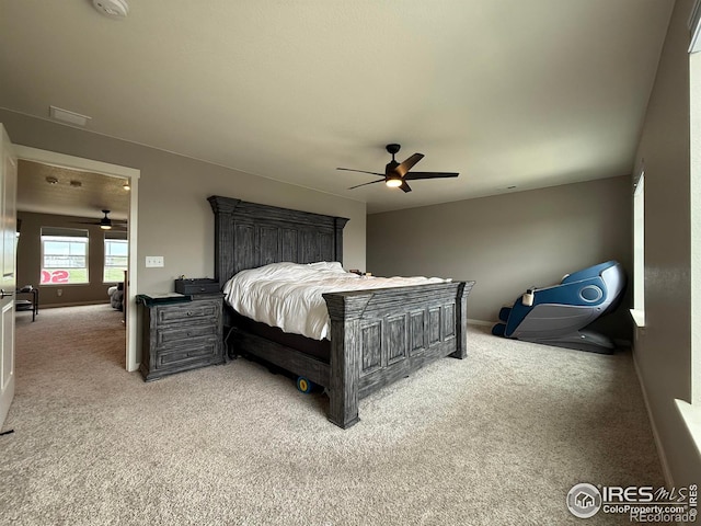 117 N 66th Ave, Greeley, CO 80634 - carpeted bedroom with baseboards and a ceiling fan