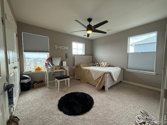 117 N 66th Ave, Greeley, CO 80634 - carpeted bedroom featuring ceiling fan and baseboards