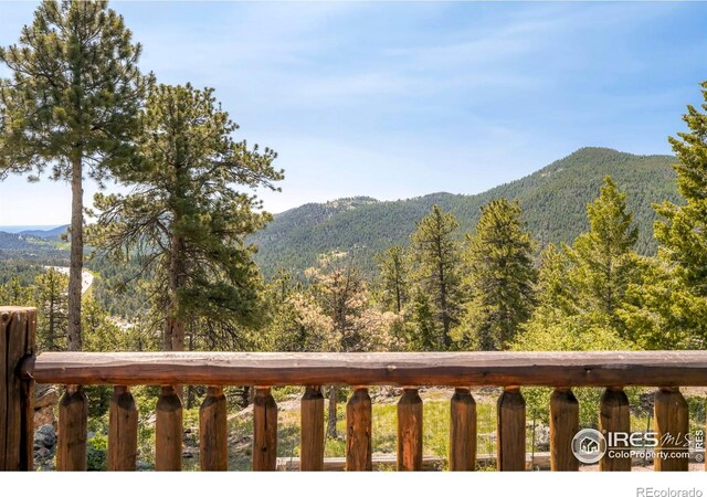24043 Eagle Cliff Trl, Conifer, CO 80433 - view of mountain backdrop featuring a forest