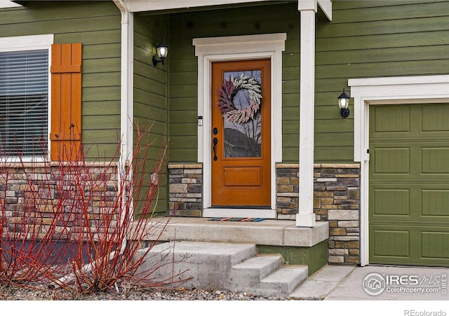 2310 Angus St, Mead, CO 80542 - entrance to property featuring stone siding and a porch