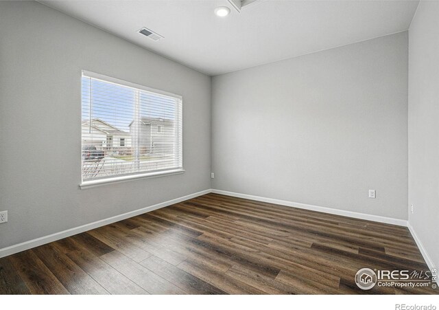 2310 Angus St, Mead, CO 80542 - unfurnished room featuring dark wood-style flooring and recessed lighting