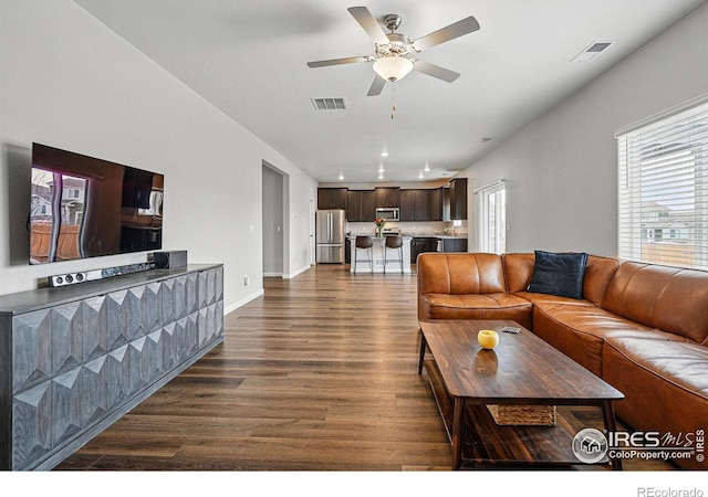 2310 Angus St, Mead, CO 80542 - living area featuring dark wood-style floors, ceiling fan, and recessed lighting