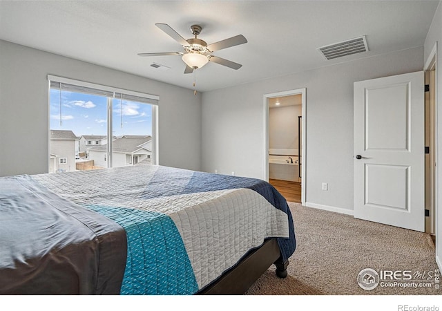 2310 Angus St, Mead, CO 80542 - carpeted bedroom with ceiling fan and ensuite bath