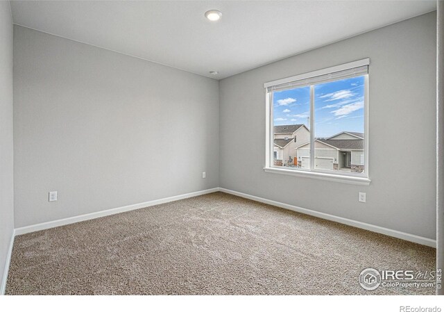2310 Angus St, Mead, CO 80542 - empty room with baseboards and carpet