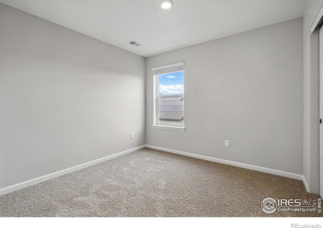 2310 Angus St, Mead, CO 80542 - carpeted spare room featuring baseboards and recessed lighting