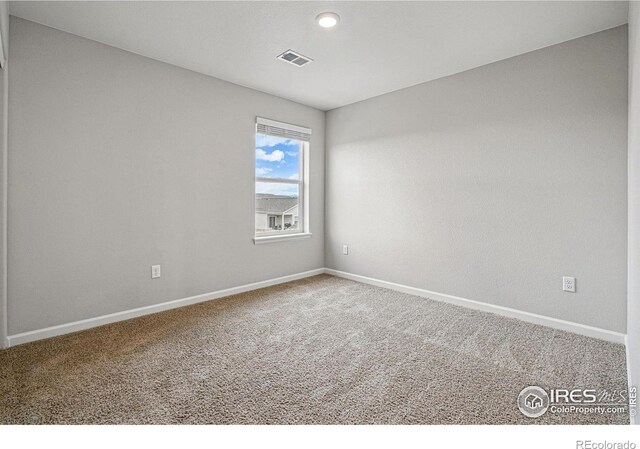 2310 Angus St, Mead, CO 80542 - carpeted spare room featuring baseboards
