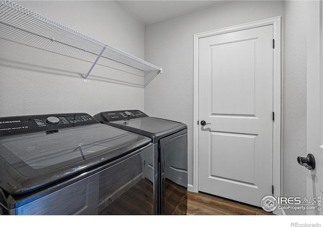 2310 Angus St, Mead, CO 80542 - laundry area featuring washer and clothes dryer and dark wood-style floors
