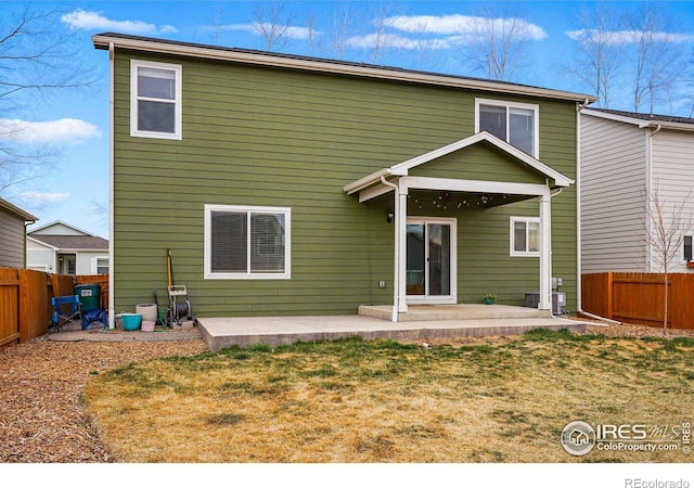 2310 Angus St, Mead, CO 80542 - rear view of house featuring a patio area and a fenced backyard
