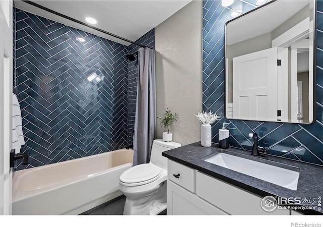 2384 Ponderosa Pl, Erie, CO 80516 - full bathroom with vanity, shower / bath combination with curtain, backsplash, and tile patterned floors
