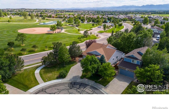 2384 Ponderosa Pl, Erie, CO 80516 - aerial perspective of suburban area featuring a mountainous background