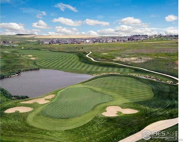 2384 Ponderosa Pl, Erie, CO 80516 - surrounding community with view of golf course and a water view