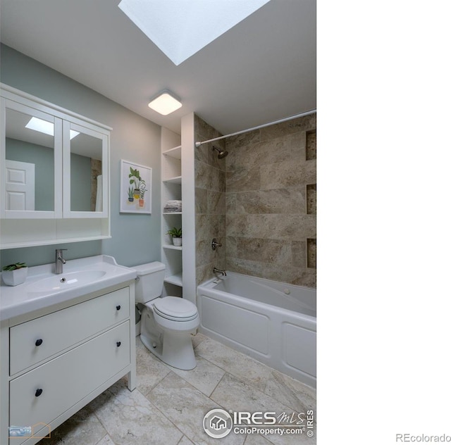 419 Centennial Dr, Louisville, CO 80027 - full bath featuring vanity, a skylight, and shower / tub combination
