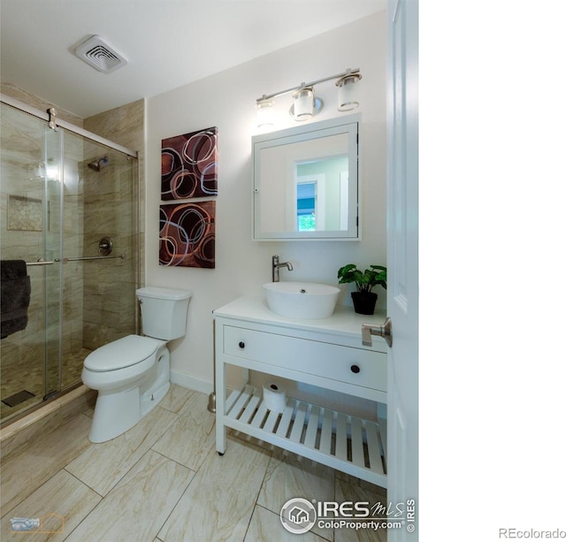 419 Centennial Dr, Louisville, CO 80027 - full bath featuring vanity, a stall shower, and marble look tile flooring