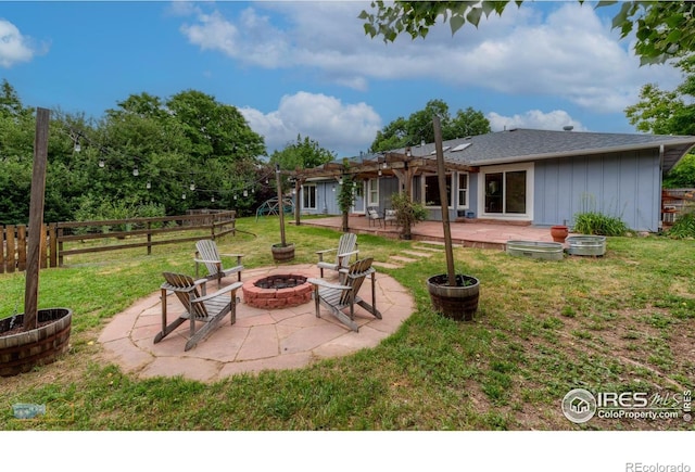 419 Centennial Dr, Louisville, CO 80027 - view of patio with an outdoor fire pit and a pergola