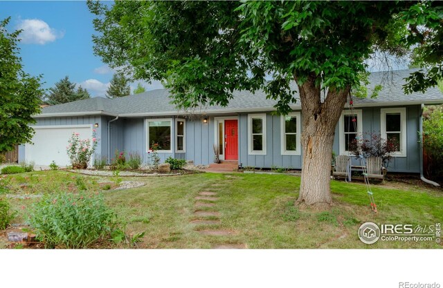419 Centennial Dr, Louisville, CO 80027 - single story home with a garage, a front lawn, board and batten siding, and a shingled roof