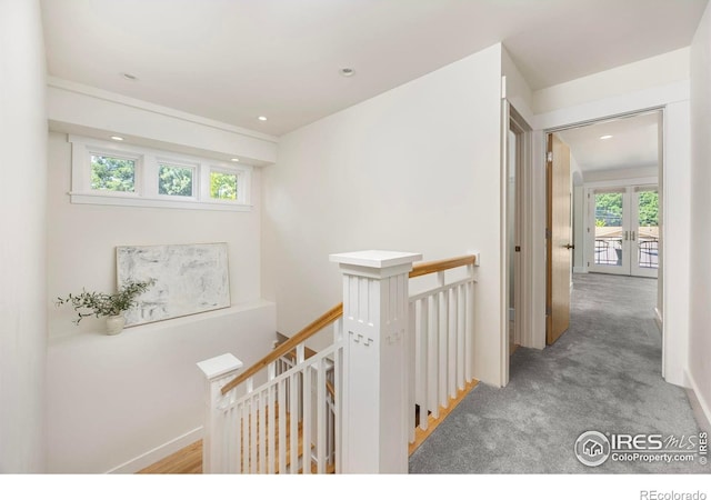 1260 Claremont Dr, Boulder, CO 80305 - hall featuring an upstairs landing, plenty of natural light, french doors, recessed lighting, and carpet