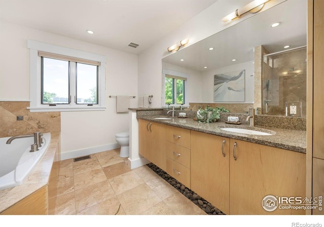 1260 Claremont Dr, Boulder, CO 80305 - full bathroom with double vanity, a shower stall, a bath, and recessed lighting