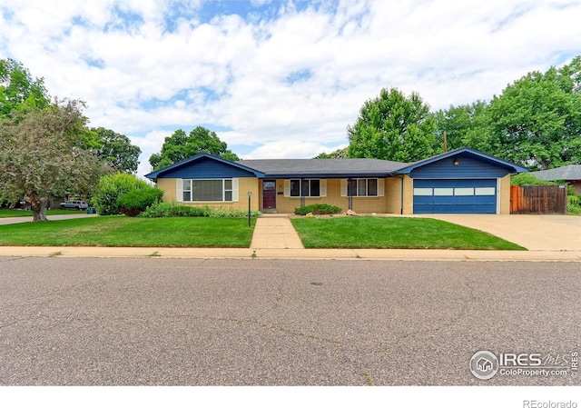 353 S Niagara St, Denver, CO 80224 - ranch-style house featuring a garage and driveway