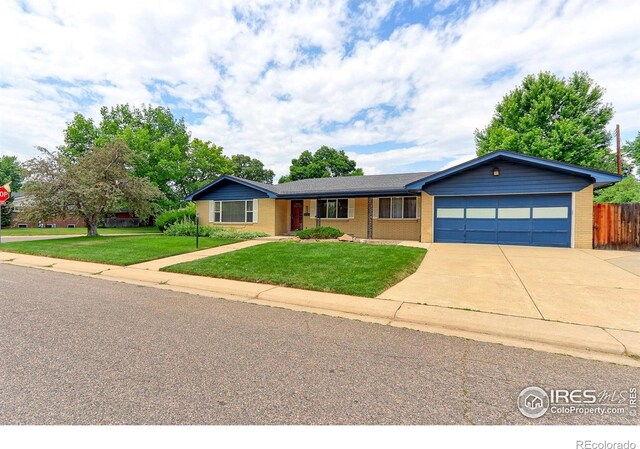 353 S Niagara St, Denver, CO 80224 - ranch-style home with an attached garage, concrete driveway, and brick siding