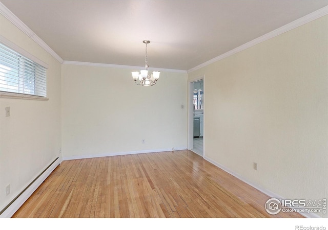 353 S Niagara St, Denver, CO 80224 - spare room featuring baseboard heating, light wood-type flooring, a chandelier, and crown molding