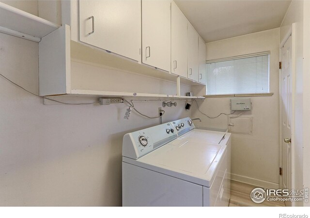 353 S Niagara St, Denver, CO 80224 - laundry area featuring independent washer and dryer, cabinet space, and wood finished floors
