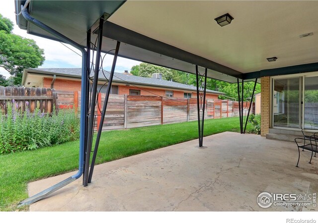 353 S Niagara St, Denver, CO 80224 - fenced backyard with a patio