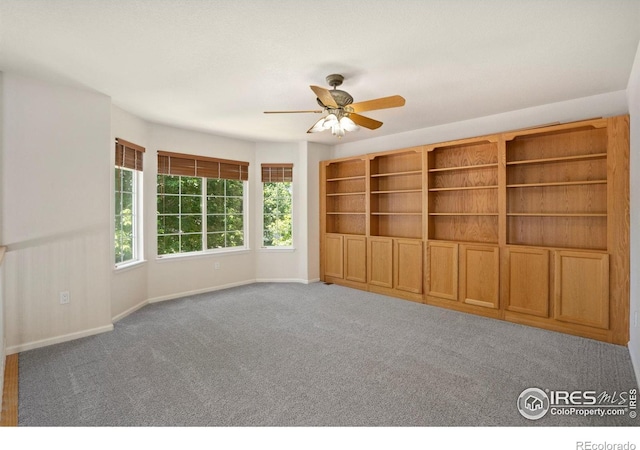 10216 Sandy Ridge Ct, Firestone, CO 80504 - unfurnished room with carpet and a ceiling fan