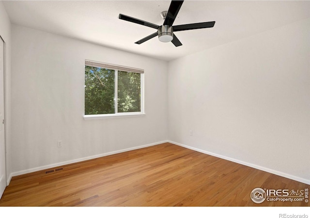 10216 Sandy Ridge Ct, Firestone, CO 80504 - spare room with wood finished floors and ceiling fan