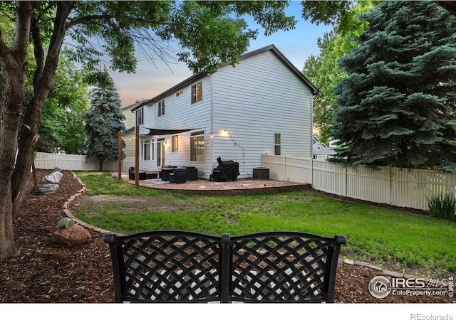 10216 Sandy Ridge Ct, Firestone, CO 80504 - back of property with a fenced backyard and a patio area