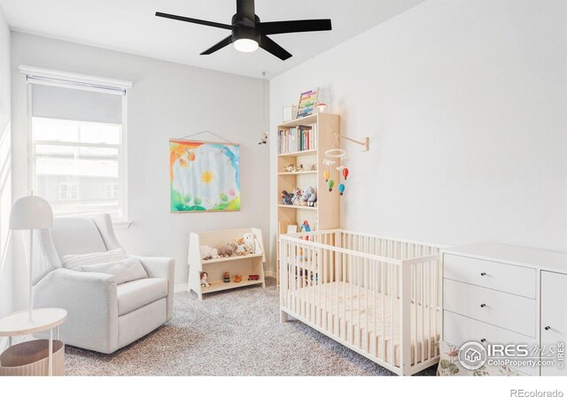 897 Winding Brook Dr, Berthoud, CO 80513 - carpeted bedroom featuring a crib and ceiling fan