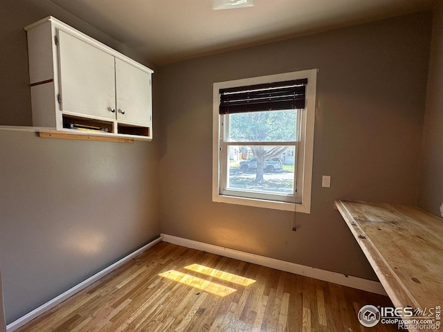 305 Euclid St, Fort Morgan, CO 80701 - unfurnished dining area with light wood finished floors and baseboards