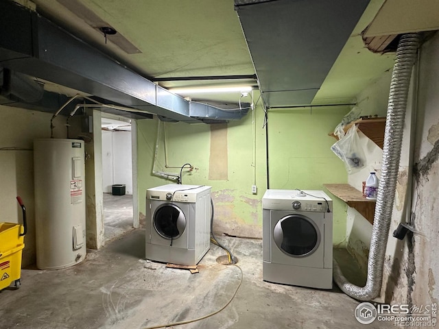 305 Euclid St, Fort Morgan, CO 80701 - laundry room with water heater and independent washer and dryer