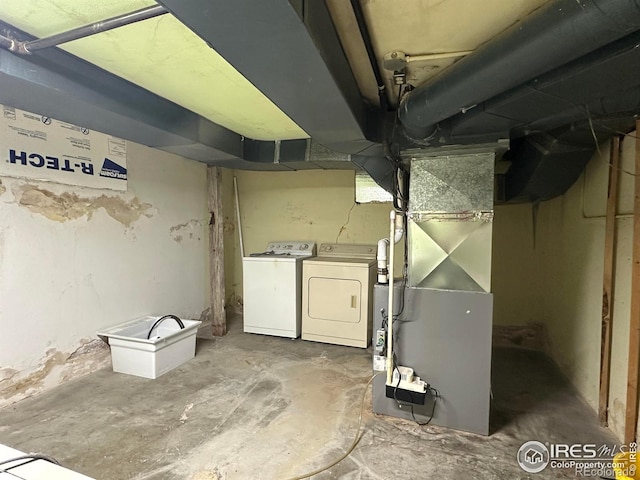 305 Euclid St, Fort Morgan, CO 80701 - unfinished basement with washing machine and dryer and heating unit