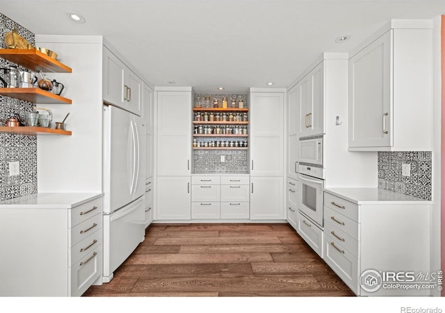 311 Sky Trail Rd, Boulder, CO 80302 - kitchen with open shelves, white appliances, wood finished floors, white cabinetry, and recessed lighting