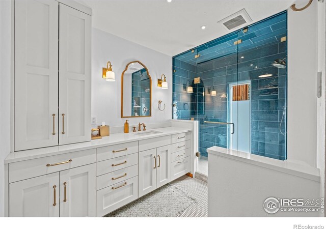 311 Sky Trail Rd, Boulder, CO 80302 - bathroom featuring a stall shower, vanity, and recessed lighting