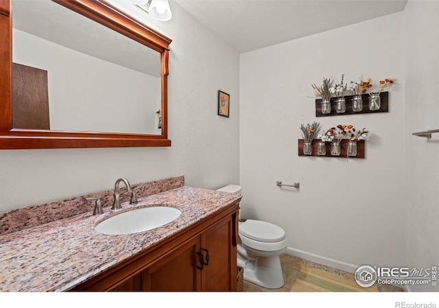 311 Sky Trail Rd, Boulder, CO 80302 - half bathroom with toilet and vanity