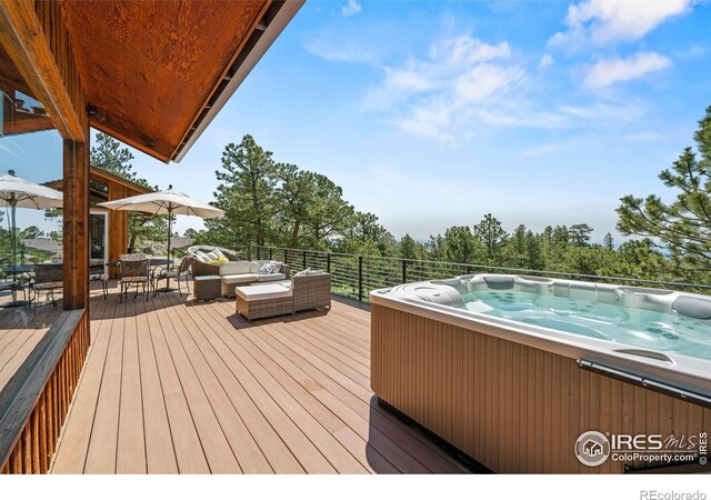 311 Sky Trail Rd, Boulder, CO 80302 - deck featuring a hot tub and outdoor lounge area