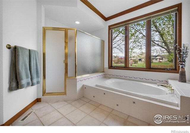 5986 Heather Way, Longmont, CO 80503 - full bathroom featuring a stall shower, a garden tub, crown molding, and tile patterned floors