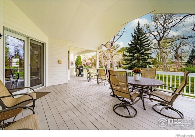 5986 Heather Way, Longmont, CO 80503 - deck featuring outdoor dining space and grilling area