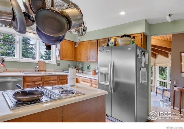 394 Deer Trail Cir, Boulder, CO 80302 - kitchen with appliances with stainless steel finishes, light countertops, brown cabinets, and recessed lighting