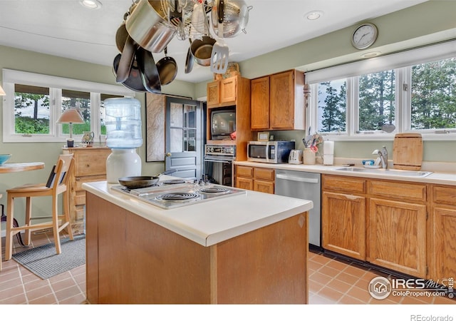 394 Deer Trail Cir, Boulder, CO 80302 - kitchen featuring appliances with stainless steel finishes, plenty of natural light, light countertops, a kitchen island, and recessed lighting