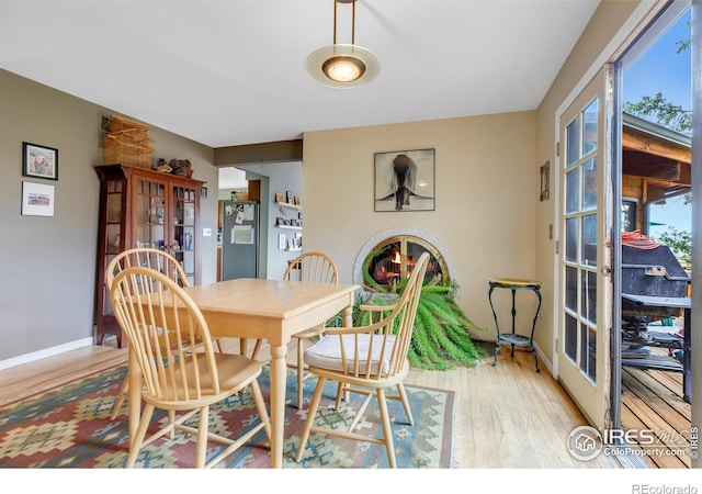 394 Deer Trail Cir, Boulder, CO 80302 - dining space with light wood-type flooring and french doors