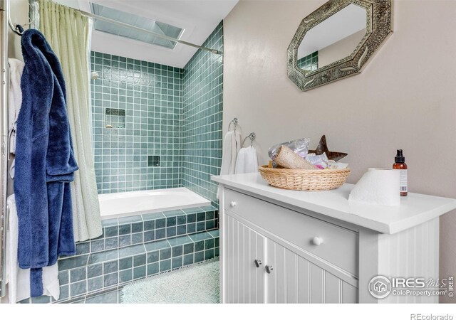 394 Deer Trail Cir, Boulder, CO 80302 - full bathroom featuring tiled shower / bath combo and vanity