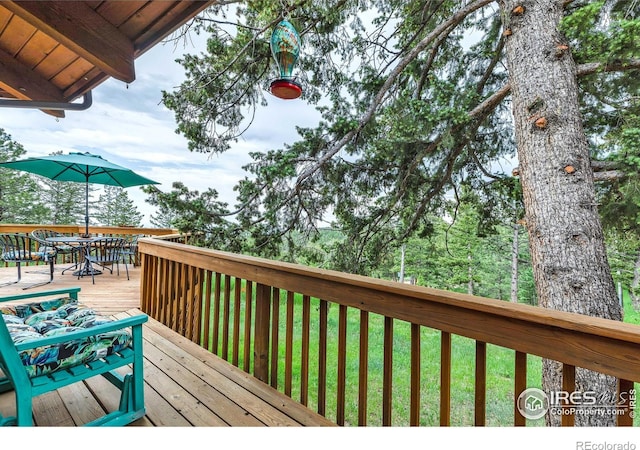 394 Deer Trail Cir, Boulder, CO 80302 - wooden deck with a yard and outdoor dining space