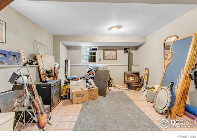 394 Deer Trail Cir, Boulder, CO 80302 - office space featuring a wood stove and tile patterned flooring