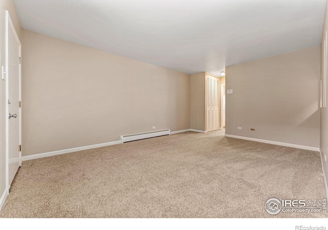 830 20th St Unit 203, Boulder, CO 80302 - empty room featuring a baseboard radiator and carpet flooring