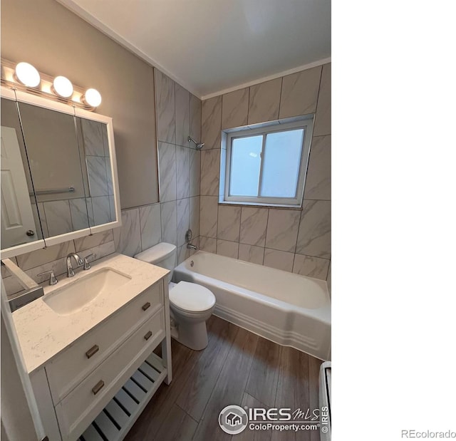 830 20th St Unit 203, Boulder, CO 80302 - full bathroom featuring tile walls, vanity,  shower combination, and wood finished floors